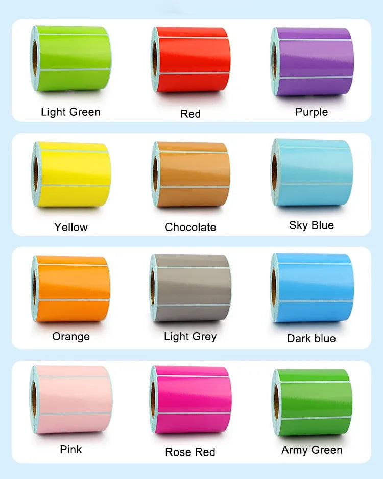 Assorted colored thermal label rolls including orange, light grey, and dark blue rolls.