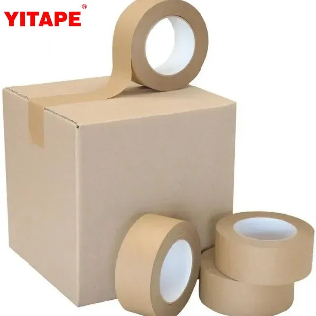 Brown kraft paper tape on dispenser roll and extra rolls for packing and sealing