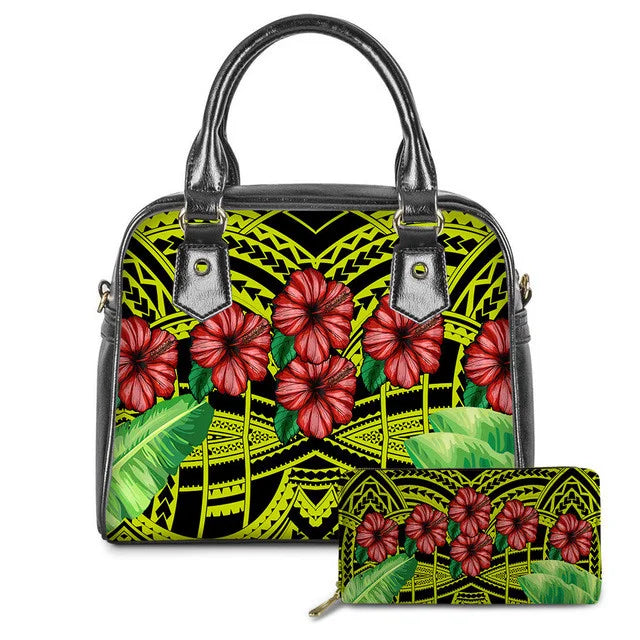 Polynesian tribal print leather handbag and wallet set with red hibiscus flowers and lime yellow accents.