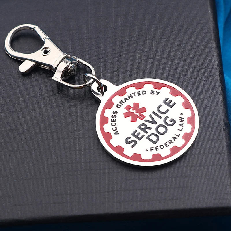 Durable metal Service Dog tag keychain in silver and red for easy identification and access rights.