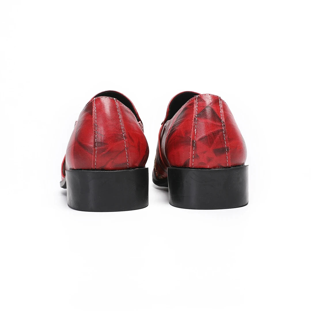 Back view of luxury red marble-print leather loafers with black block heels and metallic hardware details.