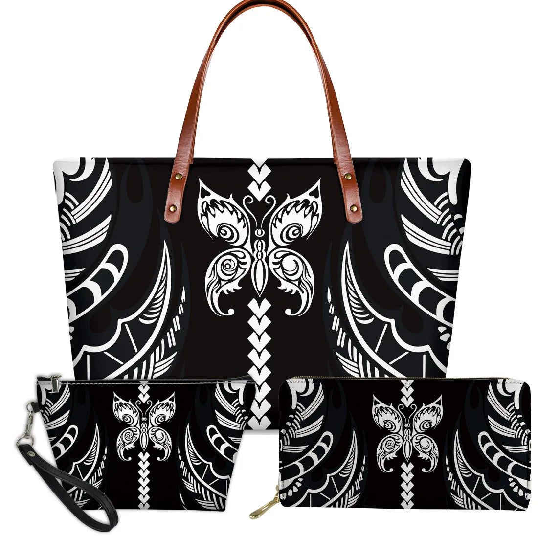 3-piece black and white handbag set with Polynesian tribal butterfly and floral patterns, featuring brown leather handles.
