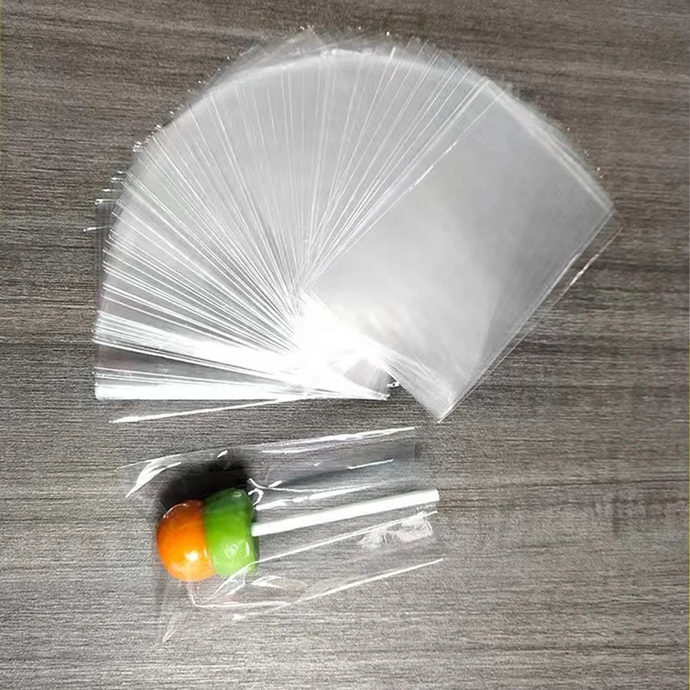 Clear self-seal poly shipping bags, 10x13 inch mailer envelopes stacked with items