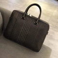 Luxury dark brown woven leather men's 13-inch slim briefcase in waxed calfskin for business office use.