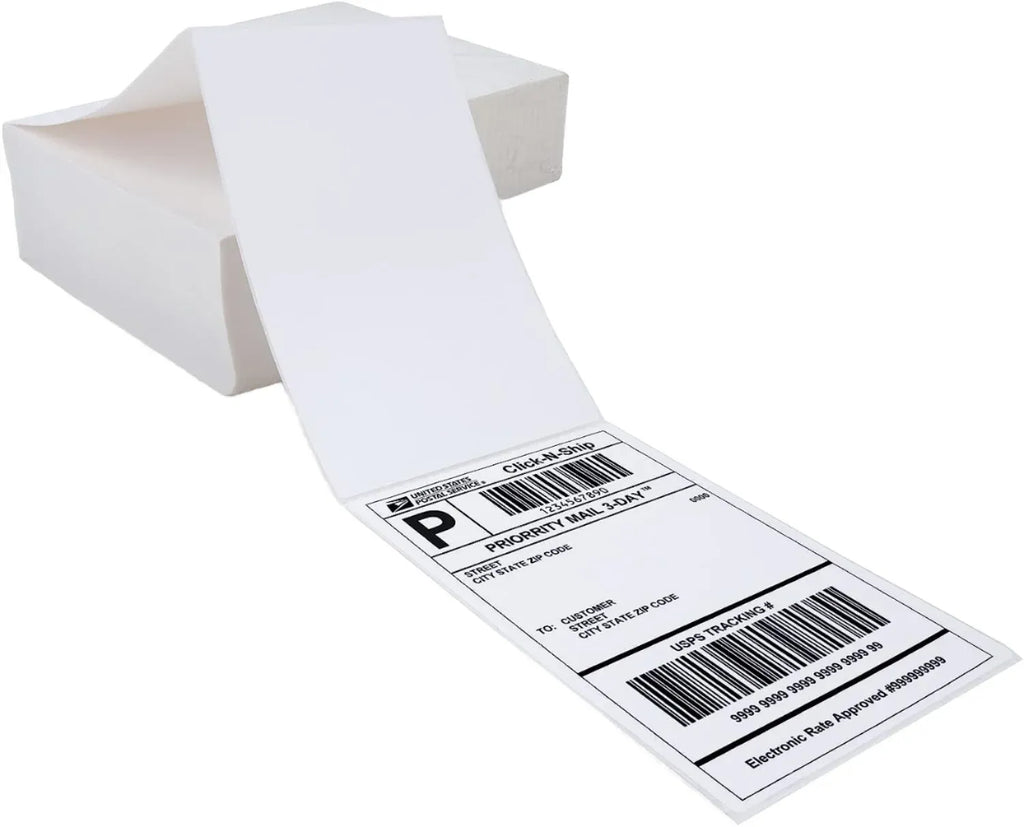 White thermal printer label stickers on backing sheet with barcode