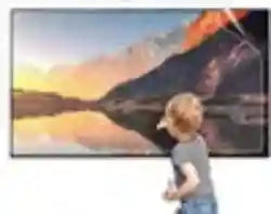 Large flat-screen television with a thin black frame, displaying a scenic mountain landscape, wall-mounted.