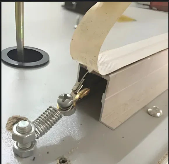 Manual band sealer heating tool using brown PTFE tape