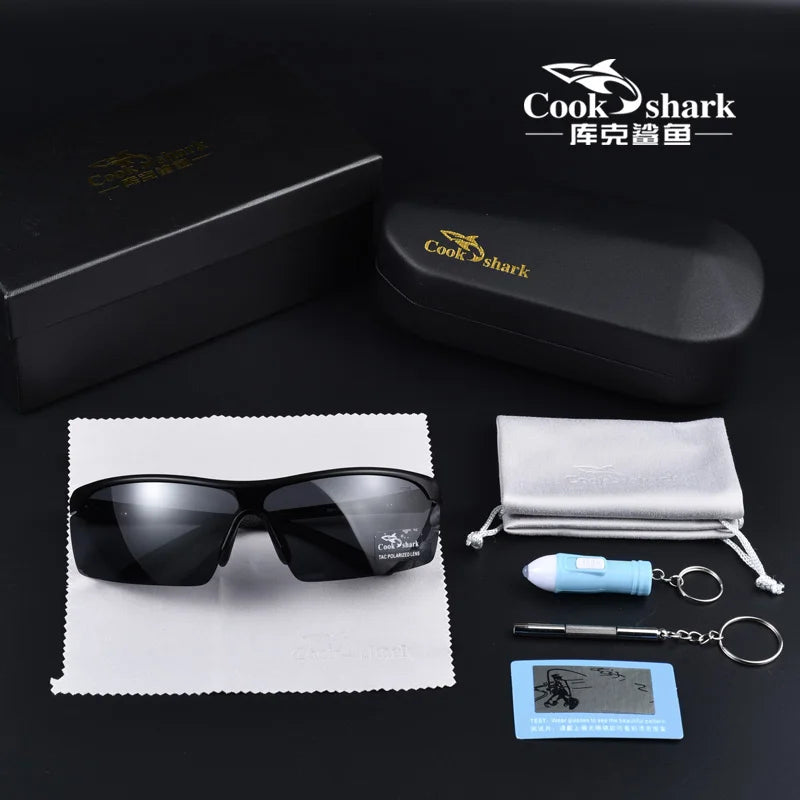 Black wrap-around polarized sunglasses with case, cleaning cloth, small flashlight, mini screwdriver, and test card.