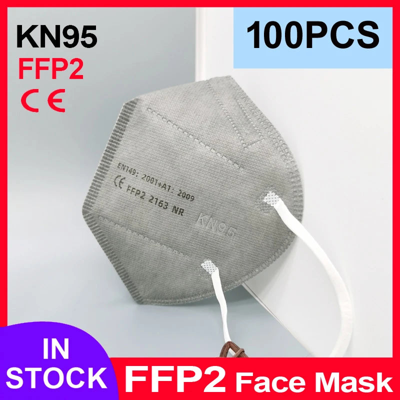 Grey 5-layer FFP2 KN95 face mask with ear loops and CE certification marking on a protective adult respiratory filter.
