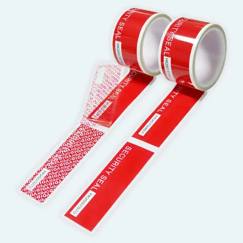 Red security seal tape roll with two strips featuring “SECURITY SEAL” and tamper void marks