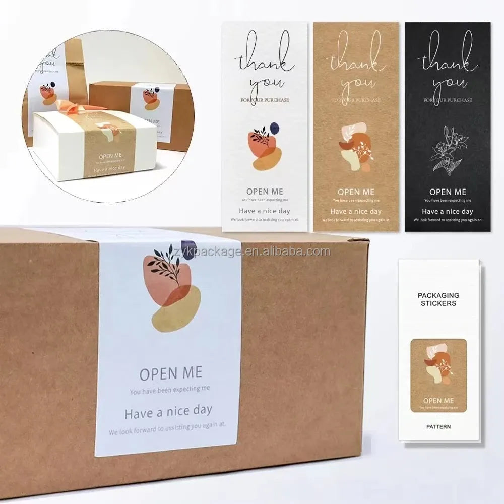 Assorted thank-you and “Open me” packaging label stickers on brown boxes.