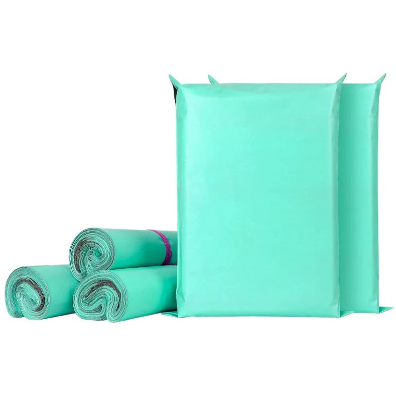 Waterproof poly mailer bag in glossy mint green with self-seal strip, plus rolled liners