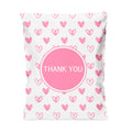 Pink heart-printed poly mailer bag with large 'THANK YOU' circle seal