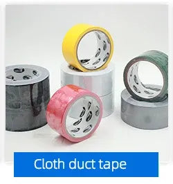 Decorative cloth duct tape rolls in red, gray, and yellow