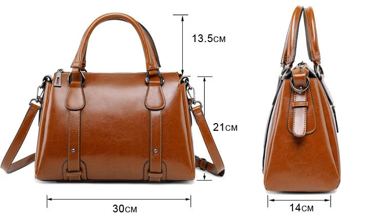 Brown genuine cow split leather designer handbag with top handles, shoulder strap, and measured satchel dimensions.