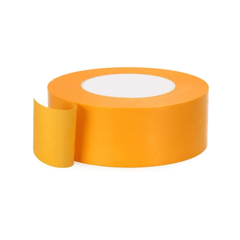 Yellow masking tape jumbo roll with small backing roll and open tape tail