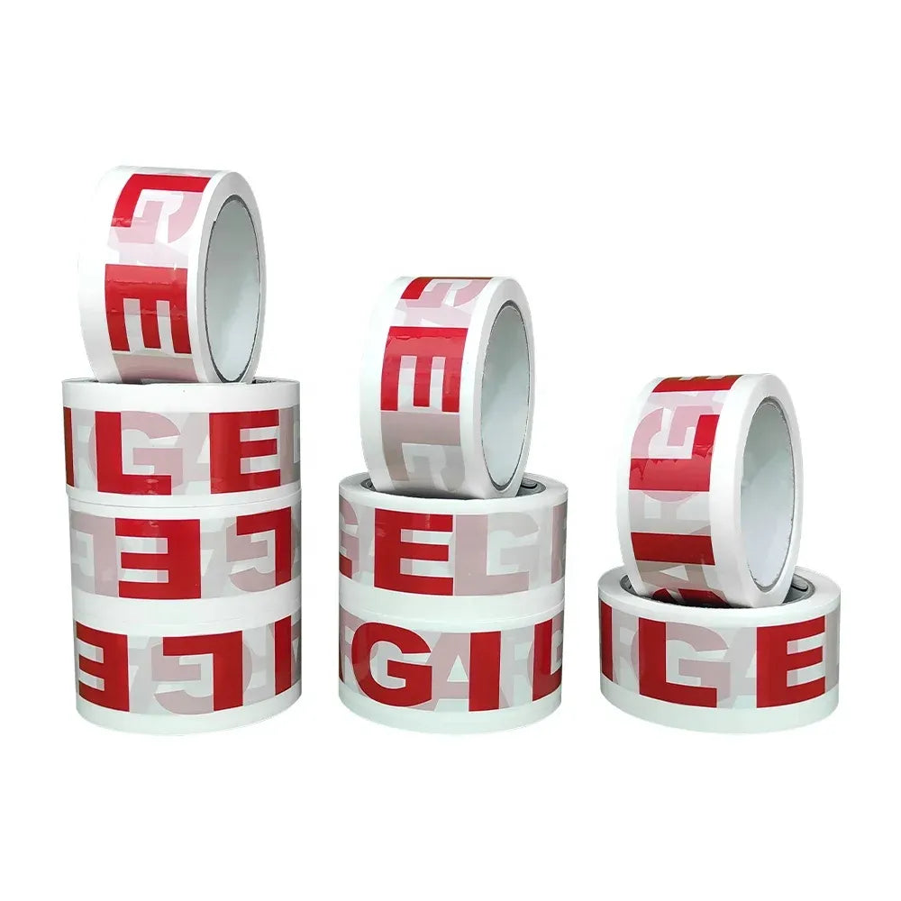 Set of printed clear packing tape rolls with red and white lettering on white cores