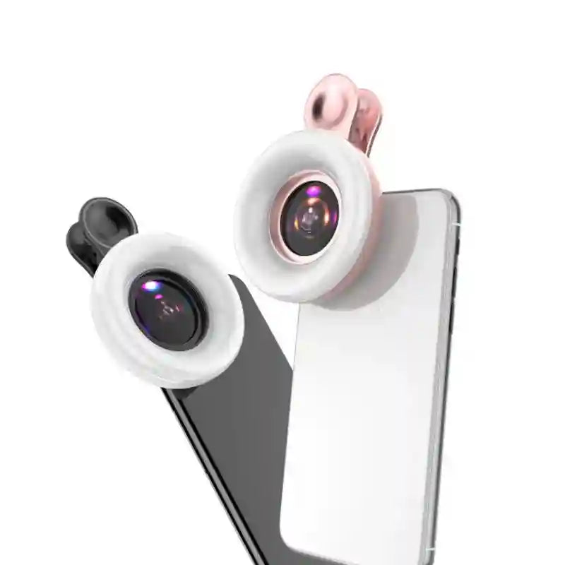 Clip-on phone ring lights and camera lenses in rose gold and black, attached to smartphones for photography.