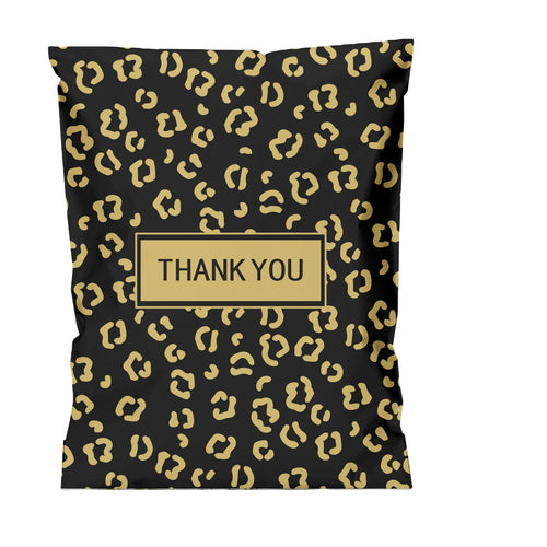 Black mailing bag with gold pattern and "THANK YOU" label