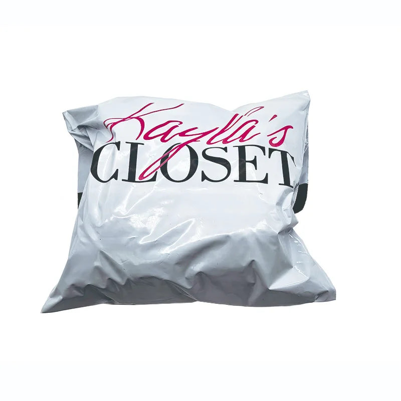 White poly mailer shipping bag with “Kayla’s CLOSET” text, heat-sealed fold