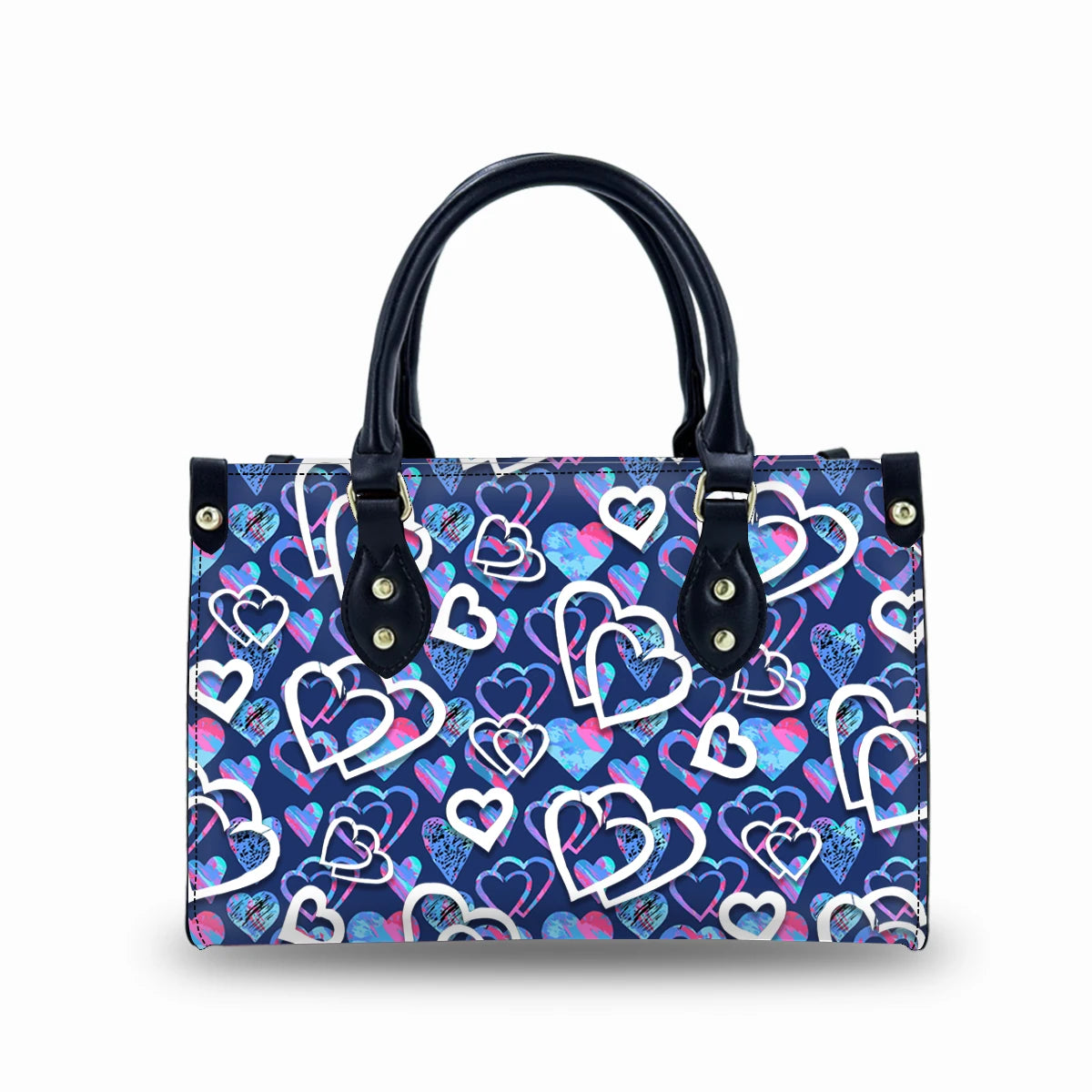 Luxury faux leather trunk handbag with navy blue heart pattern, black top handles, and gold hardware.