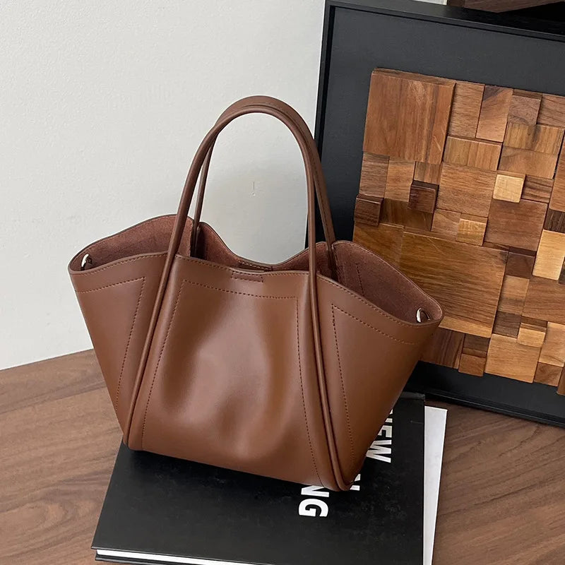 2025 Autumn Winter High-End Niche Genuine Leather Wing Bag Large Capacity Commuter Shoulder Promotional Drawstring Sportpacks