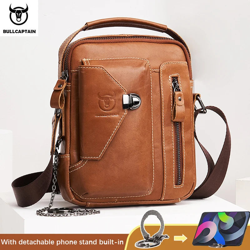 BULLCAPTAIN vintage brown cowhide leather crossbody bag with front pocket, metal clasp, and detachable phone stand.