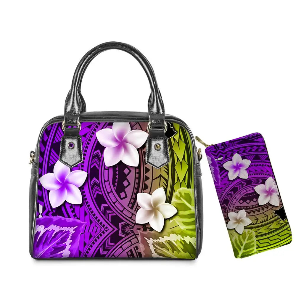 Leather handbag and matching wallet set featuring vibrant purple and green Polynesian tribal print with plumeria flowers.