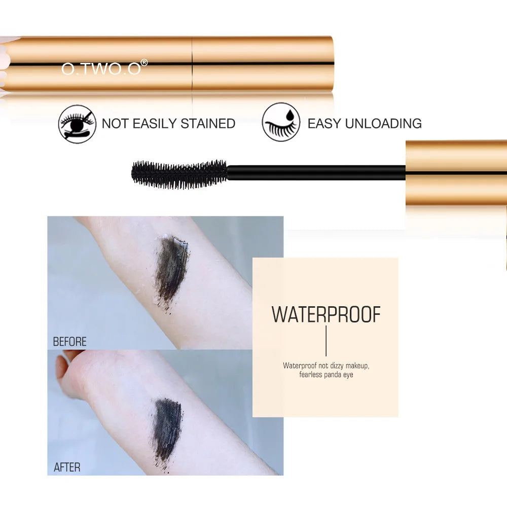 O.TWO.O gold tube 3D black mascara with precision brush and waterproof smudge-proof texture swatch on skin.