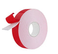 Double-sided heat resistant foam adhesive tape roll, light pink/white with red backing strip