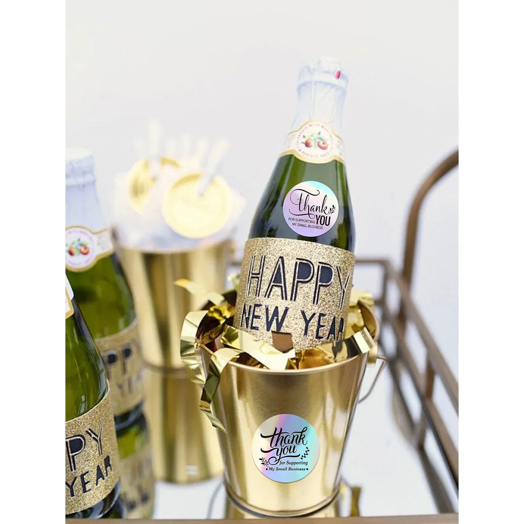 Holographic thank-you round label stickers on bottles for party gifting
