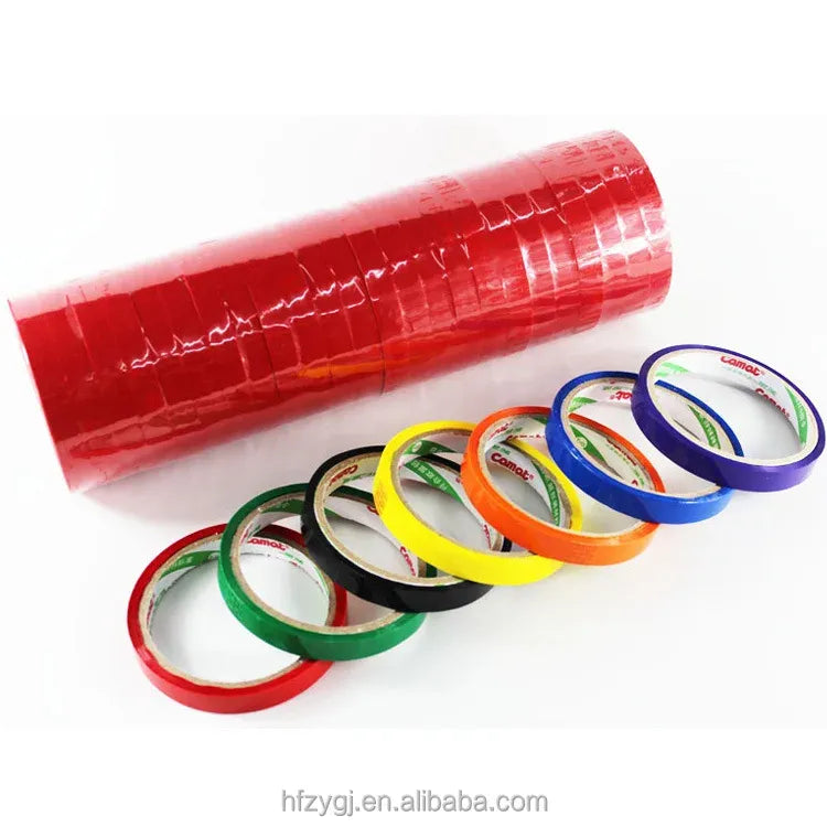 Red strapping tape roll with several small colored tape rolls in assorted colors