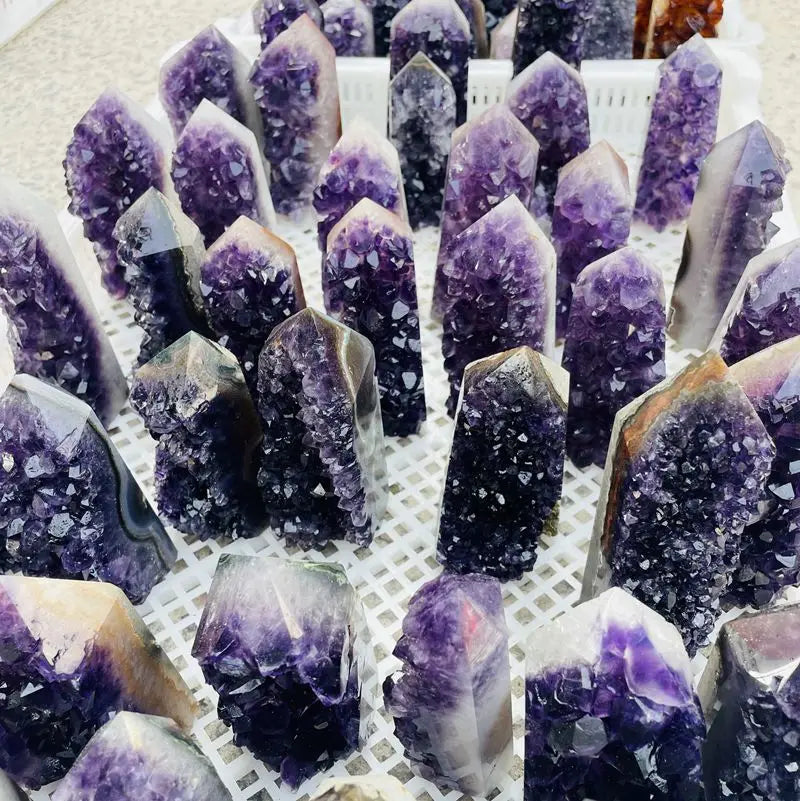 Purple amethyst druzy crystal cluster point with sparkling facets