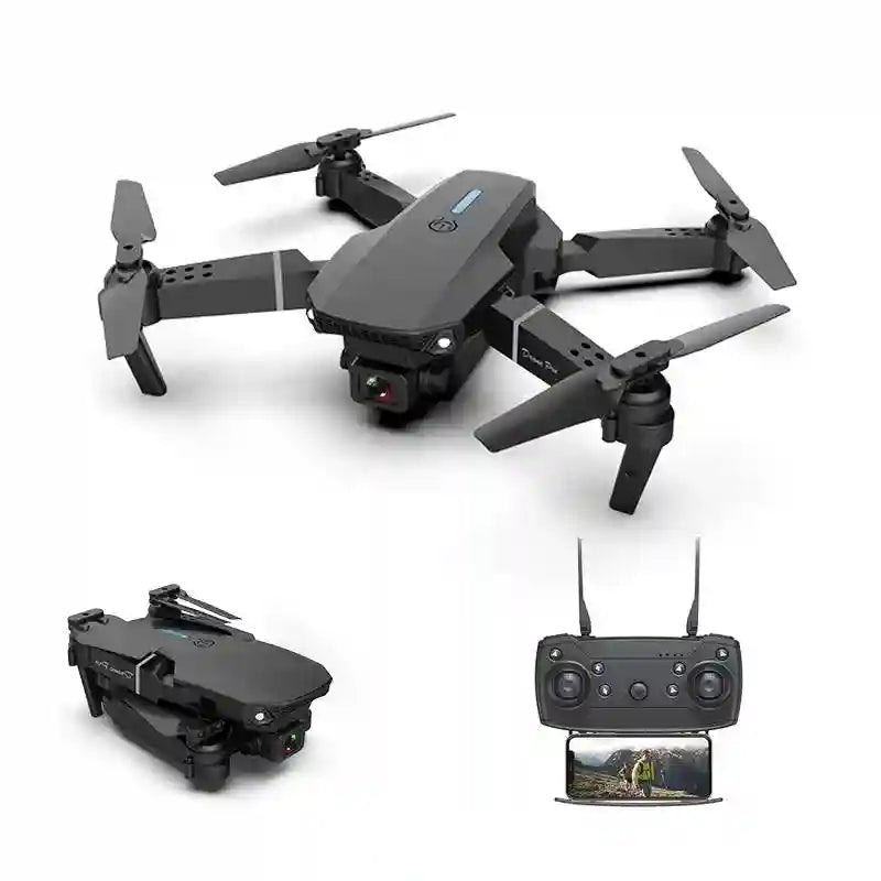 Foldable black quadcopter drone with a camera, four propellers, and a matching remote controller with phone mount.
