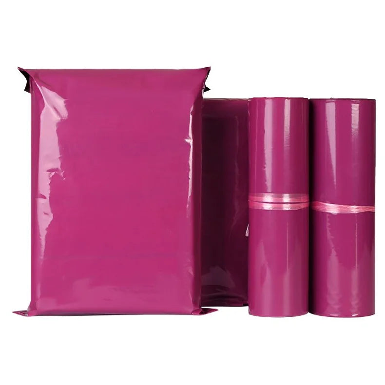 Waterproof poly mailer bag in glossy hot pink with self-seal strip, plus rolled liners