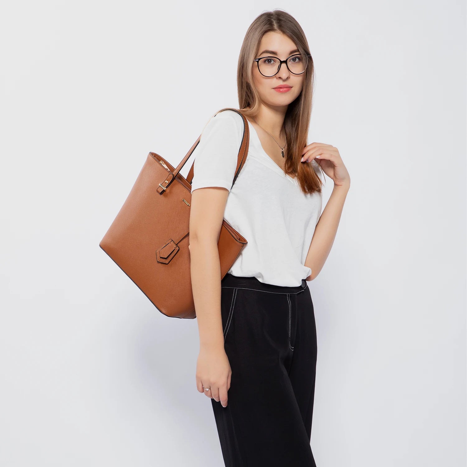 LOVEVOOK tan PU leather designer tote shoulder bag with structured shape and gold hardware accents.