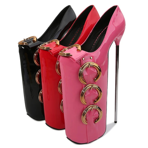 Patent leather platform high heels in black, red, and pink with gold buckles for evening statement fashion.
