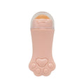 A light pink, cat-paw shaped facial oil-absorbing roller with a volcanic stone tip under a clear protective cap.