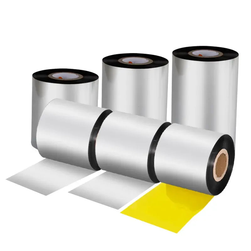 Silver hot stamping foil rolls with black cores and a gold foil sheet strip