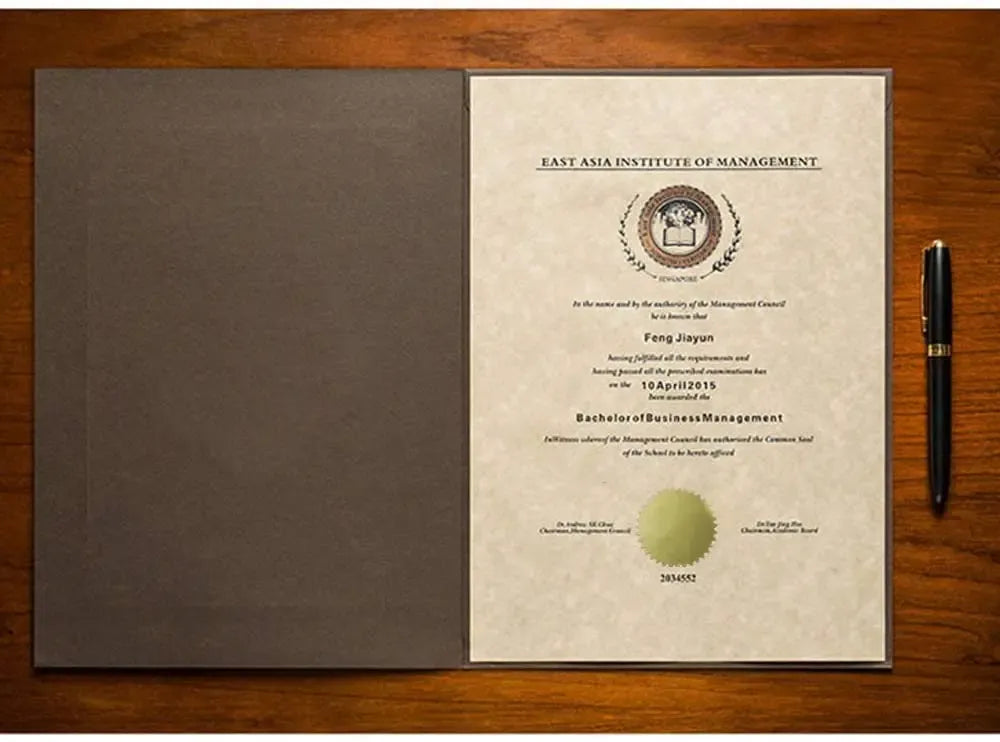 Gold foil seal label on certificate page with round stamp mark
