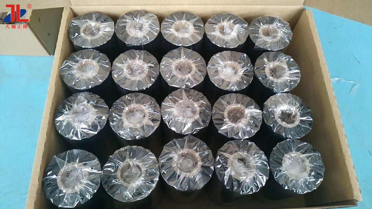 Multiple packaged resin thermal transfer ribbon spools inside a cardboard box