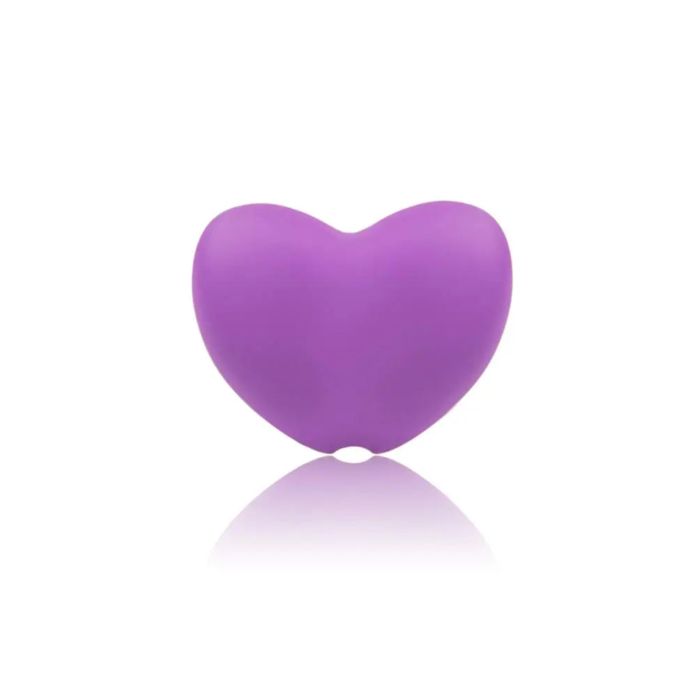 Purple heart silicone teething toy for baby teething relief.