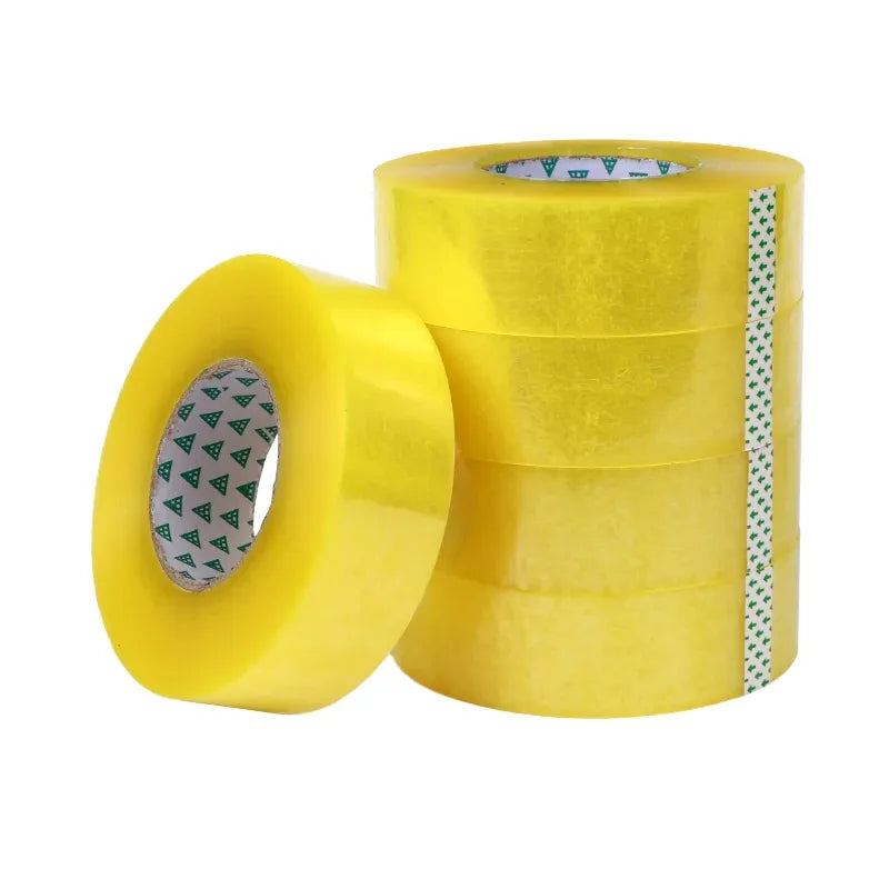 Stacked yellow packing tape rolls with printed inner core strips