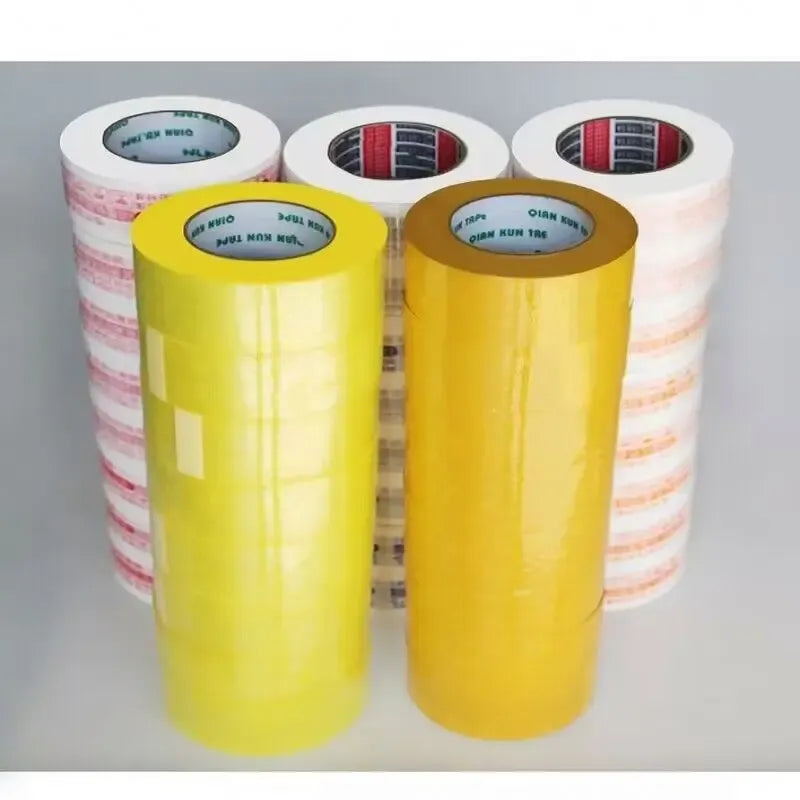 Yellow carton sealing tape rolls with core labels, single-sided adhesive