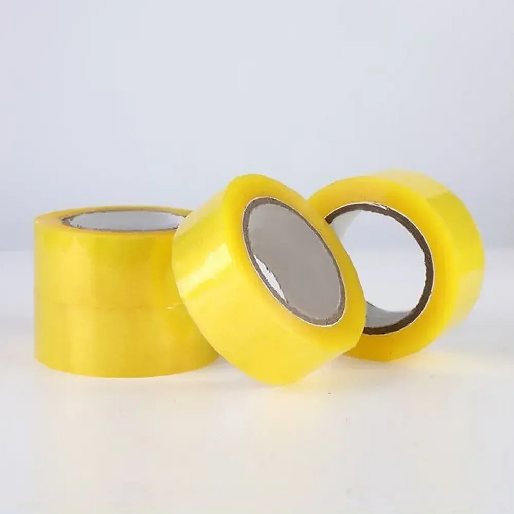 Yellow packaging tape rolls with visible cores, including overlapping tape ends