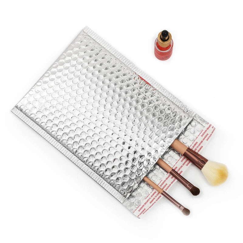 Silver bubble mailer envelope with bubble texture and side seam