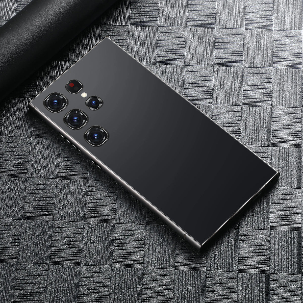 Black smartphone with quad rear cameras and slim metal frame