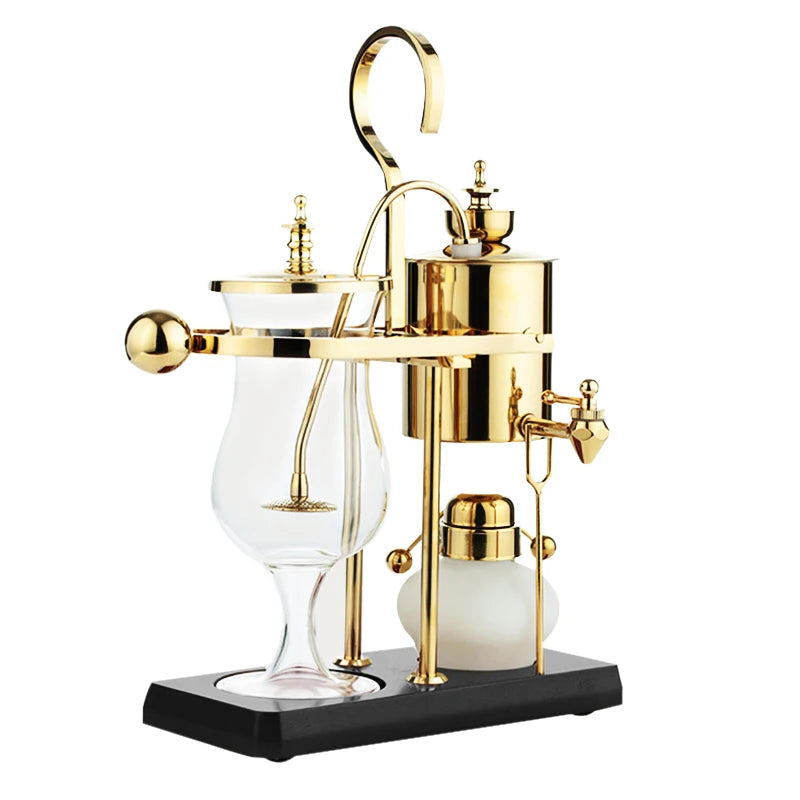 Royal Belgian balance siphon coffee maker in gold with glass carafe and black wooden base on a white background.