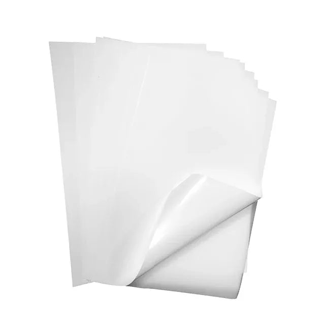 Stack of matte white self-adhesive sticker paper sheets