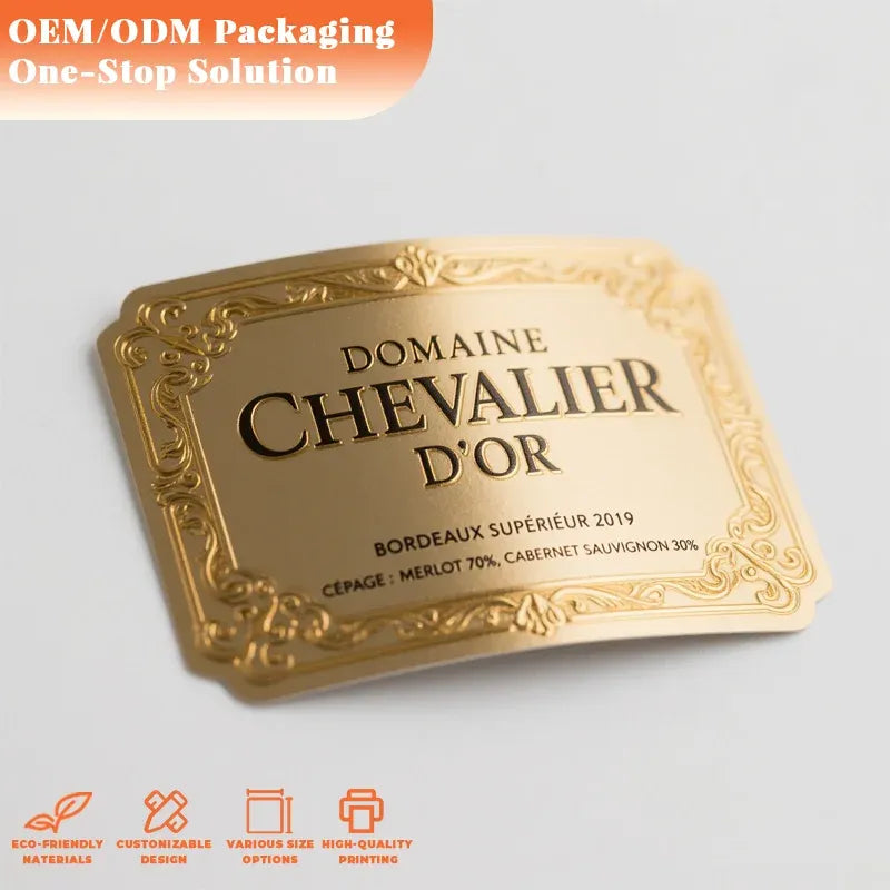 Gold rectangular embossed bottle label with ornate frame and Domaine Chevalier d’Or text